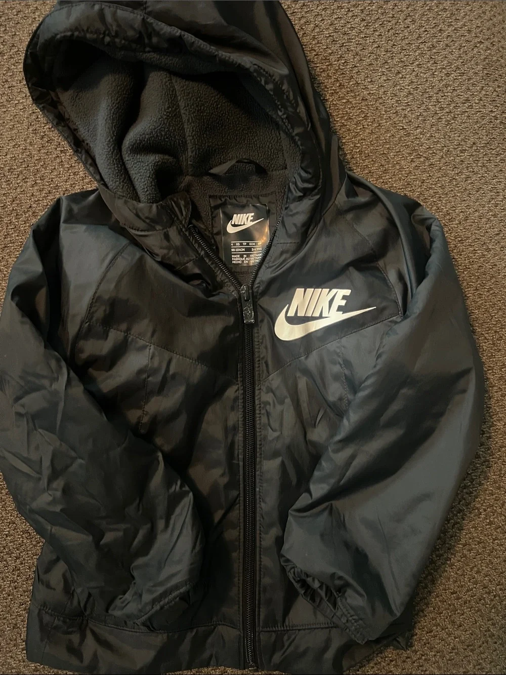 Nike Kids Black Hooded Rain Jacket with White Logo